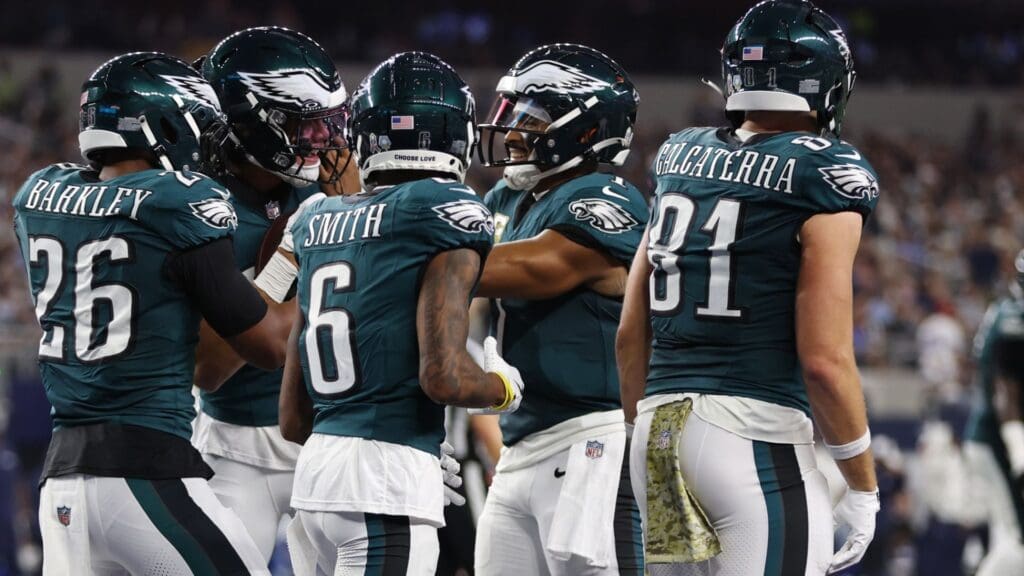 Nov 10, 2024; Arlington, Texas, USA; Philadelphia Eagles quarterback Jalen Hurts (1) celebrates a touchdown with his teammates in the third quarter against the Dallas Cowboys at AT&T Stadium.