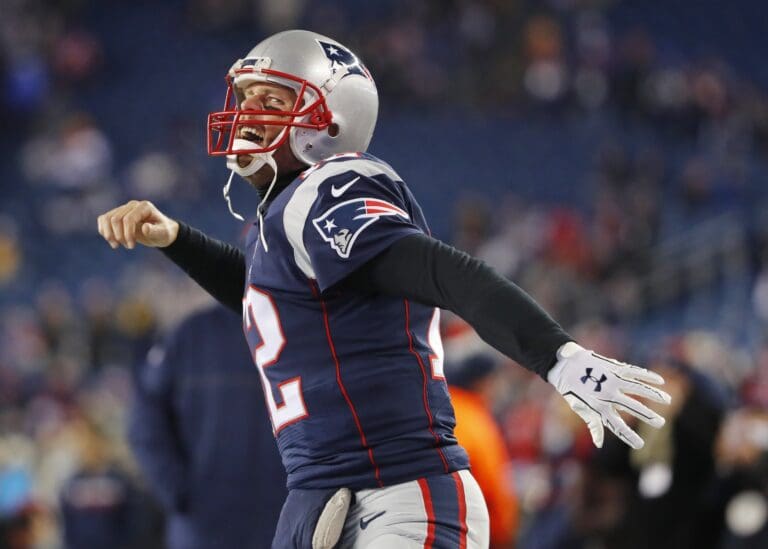 Jan 14, 2017; Foxborough, MA, USA; New England Patriots quarterback Tom Brady (12) screams as he runs onto the field before the AFC Divisional playoff game against the Houston Texans at Gillette Stadium.