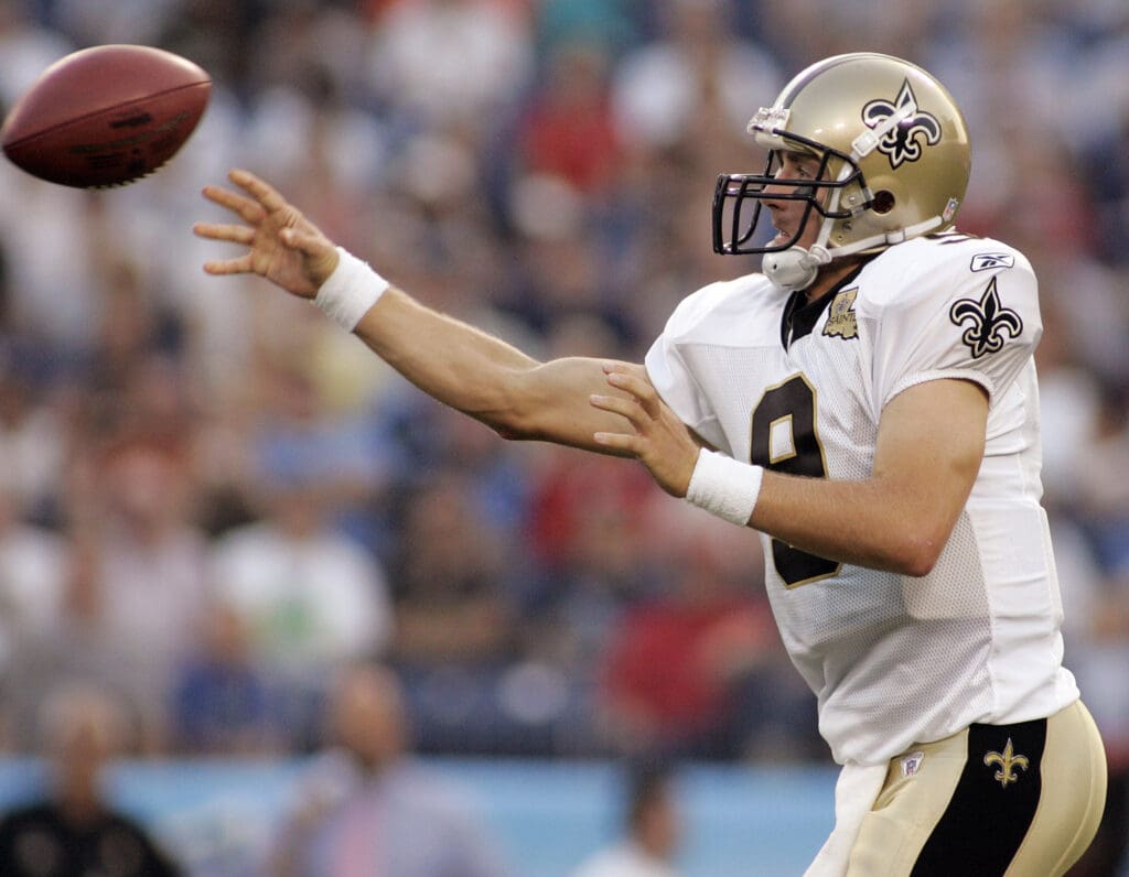 August 12, 2006; Nashville, TN, USA; New Orleans Saints quarterback Drew Brees (9) throws a pass against the Tennessee Titans in the first half of action at the LP Field.