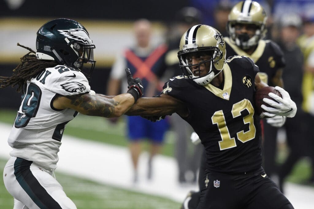 Jan 13, 2019; New Orleans, LA, USA; New Orleans Saints wide receiver Michael Thomas (13) stiff arms Philadelphia Eagles free safety Avonte Maddox (29) during the second quarter of a NFC Divisional playoff football game at Mercedes-Benz Superdome.