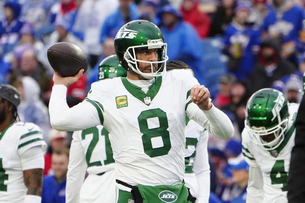 Dec 29, 2024; Orchard Park, New York, USA; New York Jets quarterback Aaron Rodgers (8) warms up prior to the game against the Buffalo Bills at Highmark Stadium.