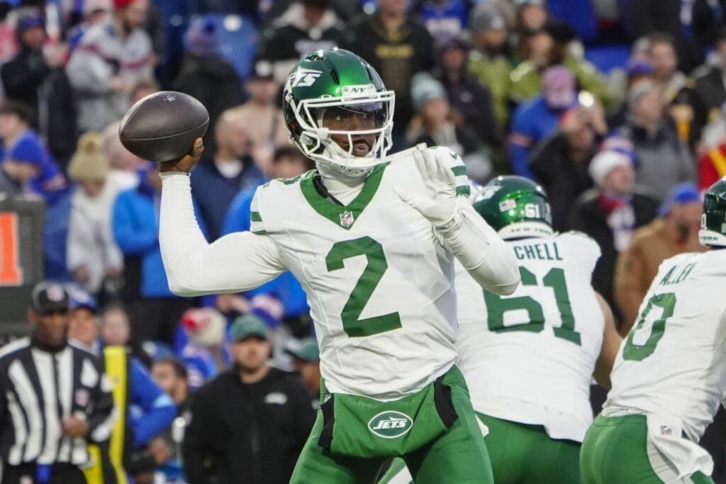 Dec 29, 2024; Orchard Park, New York, USA; New York Jets quarterback Tyrod Taylor (2) throws the ball against the Buffalo Bills during the second half at Highmark Stadium.