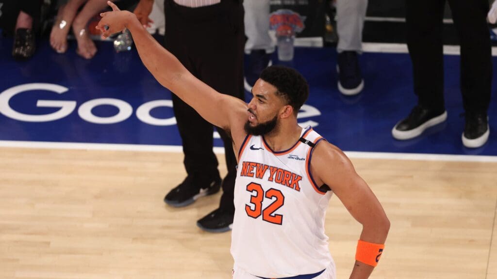 May 23, 2025; New York, New York, USA; New York Knicks center Karl-Anthony Towns (32) reacts after a three point shot against the Indiana Pacers in the third quarter during game two of the eastern conference finals for the 2025 NBA Playoffs at Madison Square Garden.