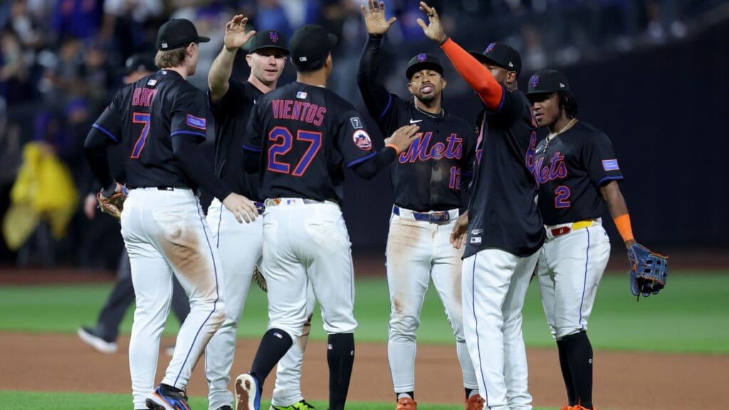May 30, 2025; New York City, New York, USA; New York Mets infielders celebrate after defeating the Colorado Rockies at Citi Field.