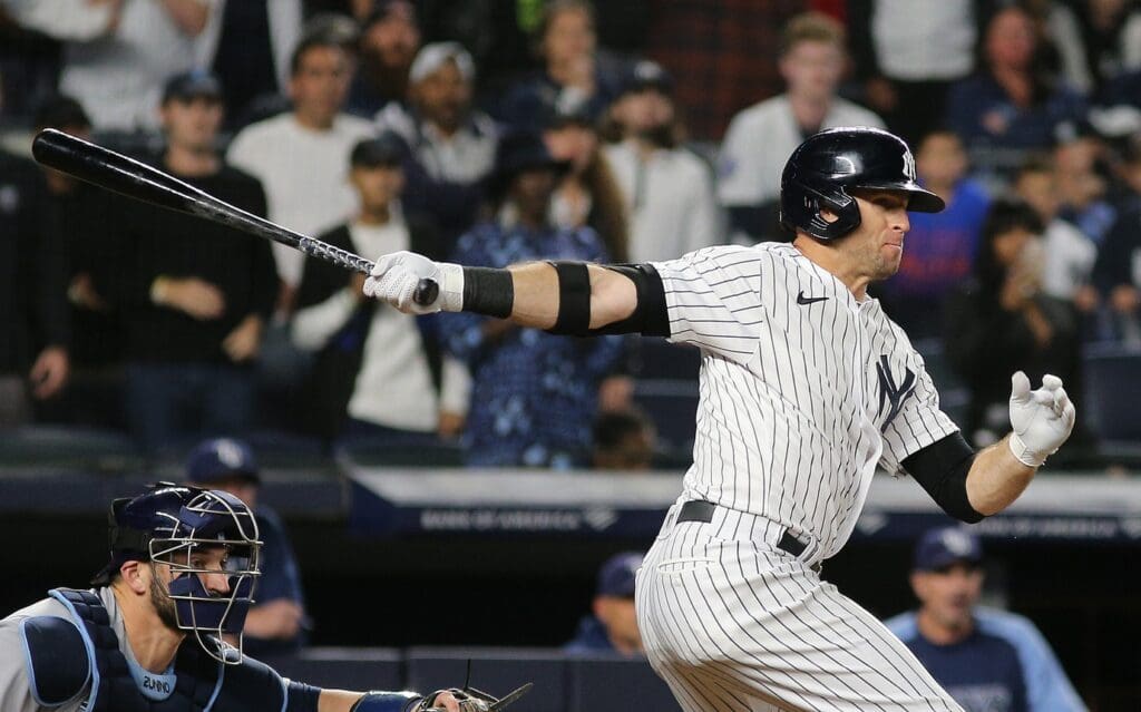 Oct 1, 2021; Bronx, New York, USA; New York Yankees center fielder Brett Gardner (11) hits a RBI single against the Tampa Bay Rays during the ninth inning at Yankee Stadium.