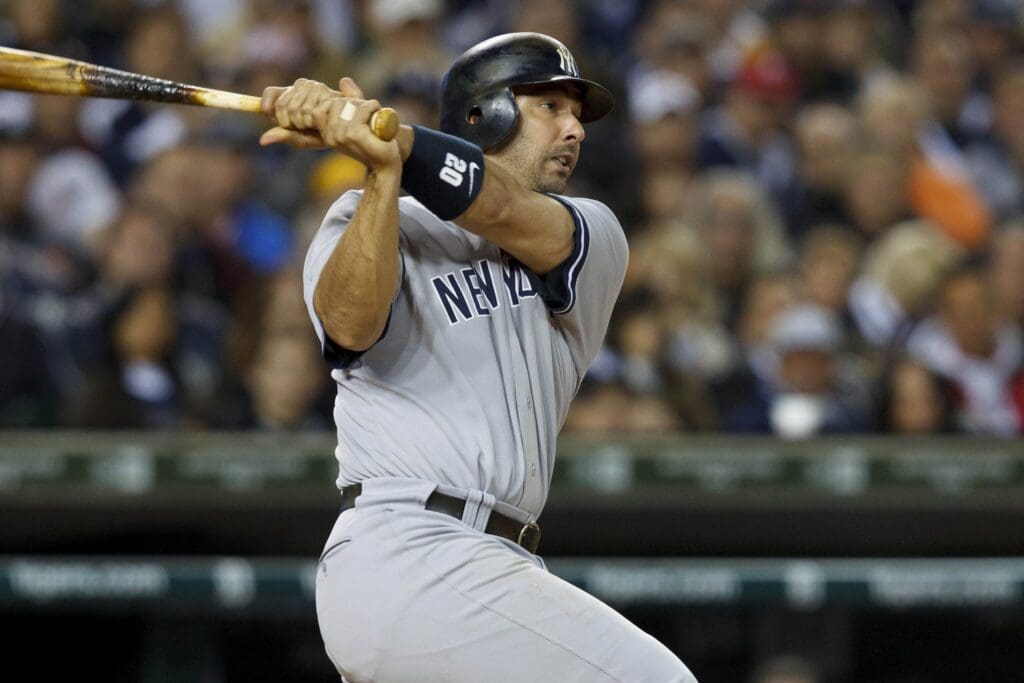 Oct 3, 2011; Detroit, MI, USA; New York Yankees designated hitter Jorge Posada (20) at bat during game three of the 2011 ALDS against the Detroit Tigers at Comerica Park.