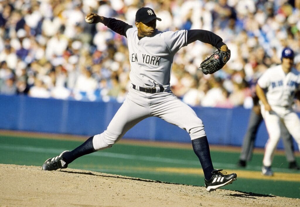 New York Yankees pitcher Orlando Hernandez in action on the mound against the Toronto Blue Jays at the SkyDome during the 1998 season.