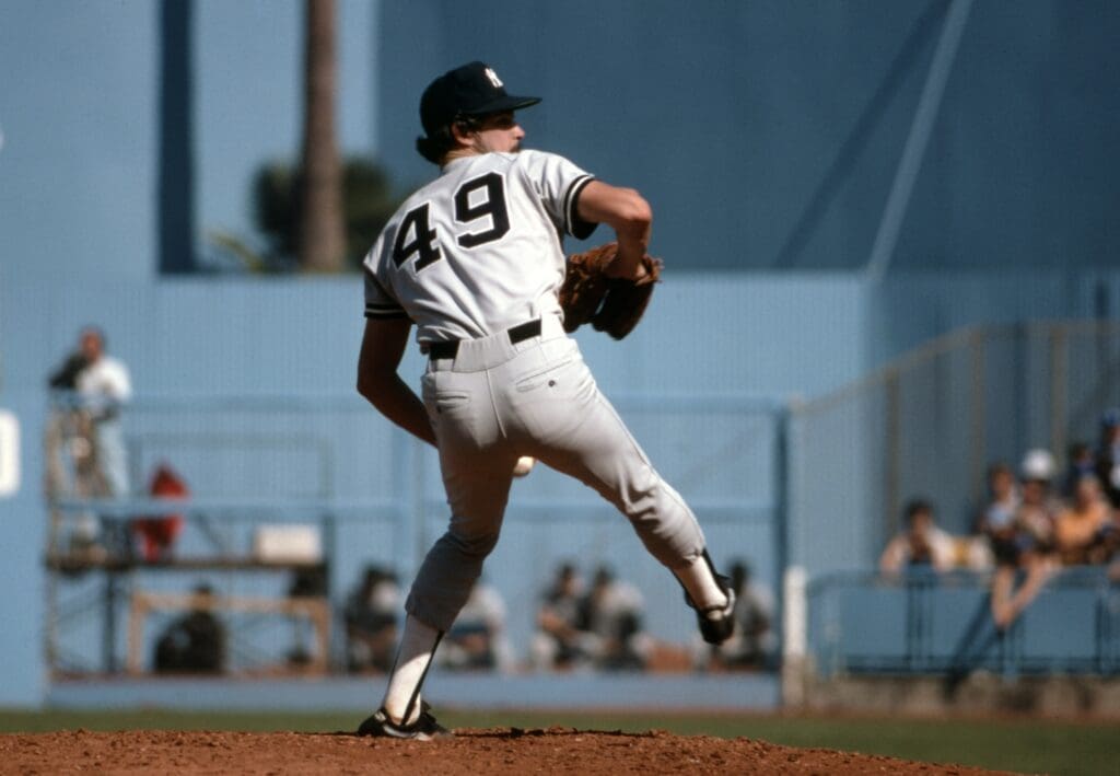 Oct 15, 1977; Los Angeles, CA, USA FILE PHOTO; New York Yankees pitcher Ron Guidry (49) delivers a pitch against the Los Angeles Dodgers in game 4 during the 1977 World Series at Dodger Stadium. The Yankees defeated the Dodgers 4 games to 2.