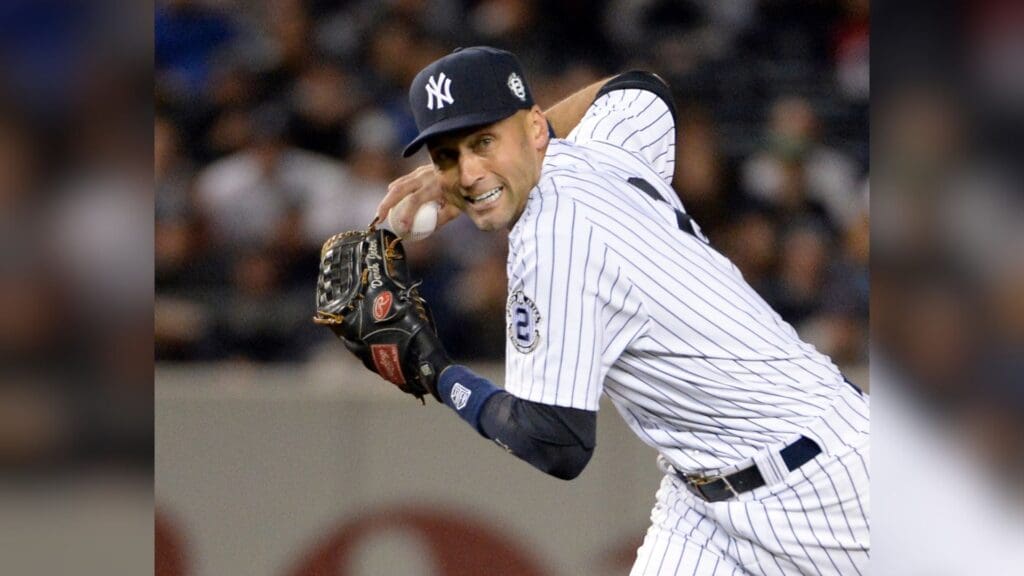 Sep 25, 2014; Bronx, NY, USA; New York Yankees shortstop Derek Jeter (2) makes a play against the Baltimore Orioles at Yankee Stadium.