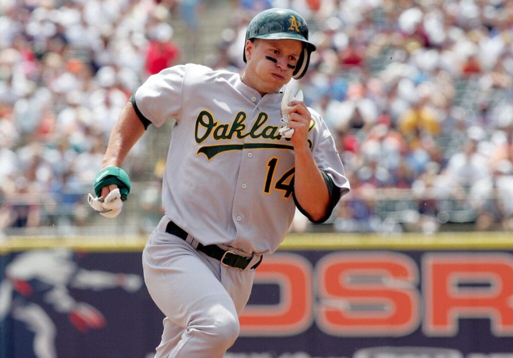 July 23, 2006; Detroit, MI, USA; Oakland Athletics second baseman (14) Mark Ellis races around third base to score a run on a double by third baseman (4) Antonio Perez (not pictured) in the 3rd inning against the Detroit Tigers at Comerica Park.