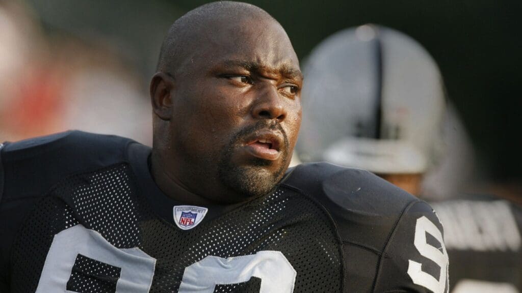Aug 6, 2006; Canton, OH, USA; Oakland Raiders defensive tackle (99) Warren Sapp in pre-game warmups against Philadelphia Eagles during the Pro Football Hall of Fame Game at Fawcett Stadium