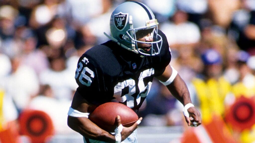 Dec 24, 1995; Oakland, CA, USA: FILE PHOTO; Oakland Raiders receiver Raghib Ismail (86) in action against the Denver Broncos at the Oakland-Alameda Coliseum