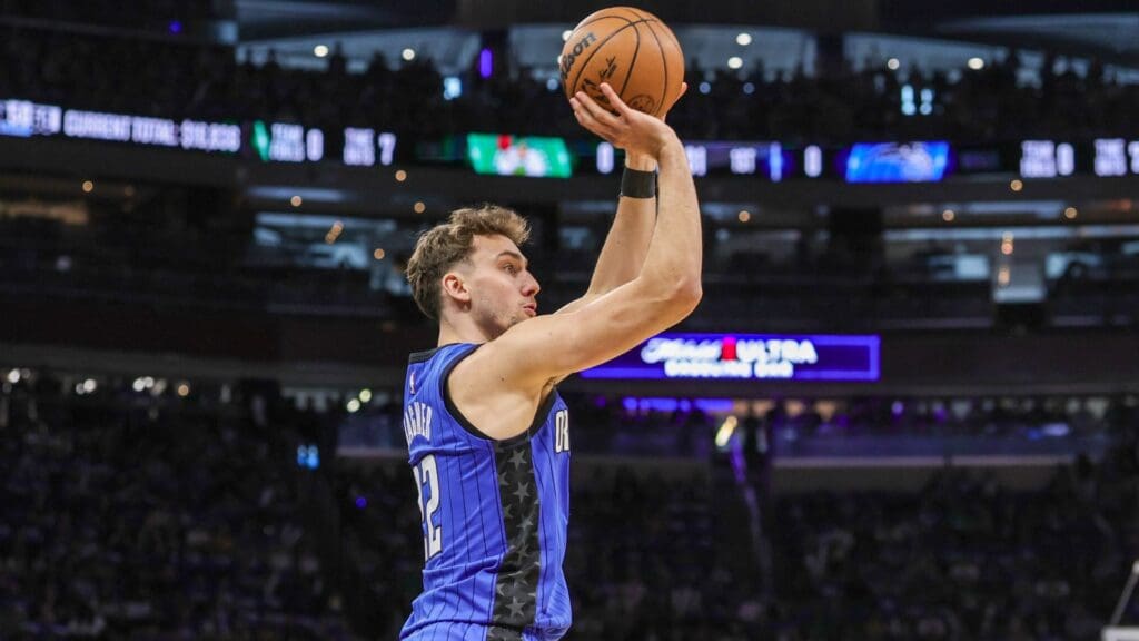 Apr 25, 2025; Orlando, Florida, USA; Orlando Magic forward Franz Wagner (22) shoots a three point basket during the first quarter of game three of first round for the 2024 NBA Playoffs against the Boston Celtics at Kia Center