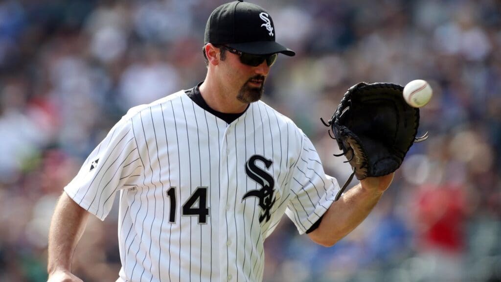 Sep 28, 2014; Chicago, IL, USA; Chicago White Sox first baseman Paul Konerko (14) heads back to the dugout after the top of the first inning against the Kansas City Royals at U.S Cellular Field. Mandatory Credit: Jerry Lai-Imagn Images