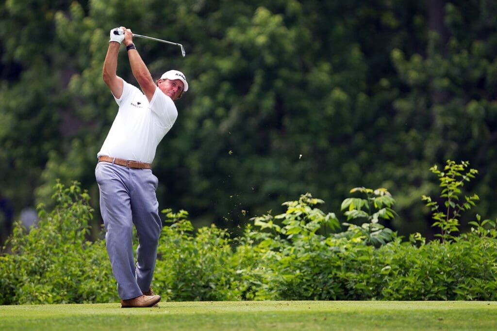 Jun 5, 2011; Dublin, OH, USA; Phil Mickelson with his drive on the 18th during the final round of the Memorial Tournament at Muirfield Village GC.