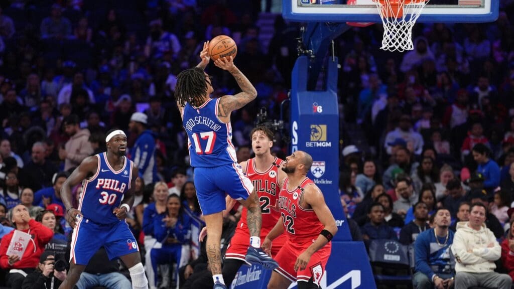 Apr 13, 2025; Philadelphia, Pennsylvania, USA; Philadelphia 76ers guard Jalen-Hood Schifino (17) shoots the ball against the Chicago Bulls in the third quarter at Wells Fargo Center.