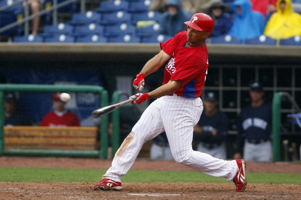 March 23, 2009; Clearwater, FL, USA; Philadelphia Phillies left fielder Raul Ibanez (29) hits an double as his bat slides out of his hands against New York Yankees during their spring training game at Bright House Networks Field.