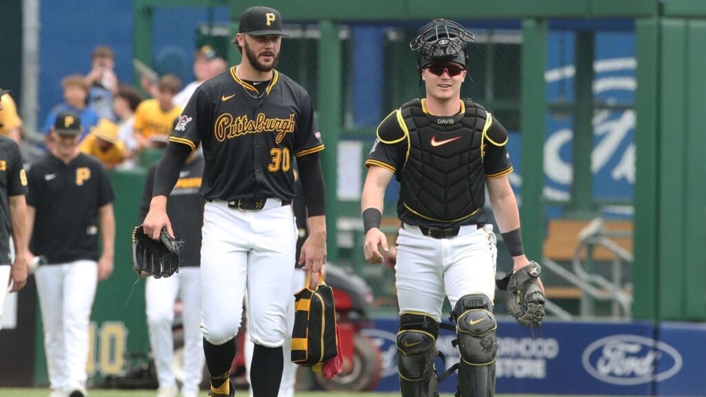 May 1, 2025; Pittsburgh, Pennsylvania, USA; Pittsburgh Pirates starting pitcher Paul Skenes (30) and catcher Henry Davis (32) make their way in from the bullpen to play the Chicago Cubs at PNC Park