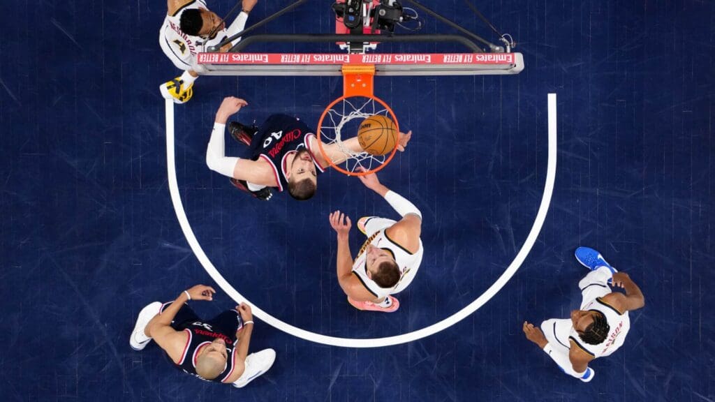 May 1, 2025; Inglewood, California, USA; LA Clippers center Ivica Zubac (40) shoots the ball against Denver Nuggets center Nikola Jokic (15) in the first half during game six of first round for the 2025 NBA Playoffs at Intuit Dome.