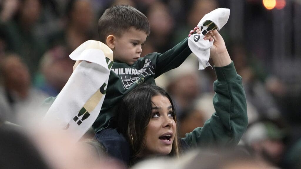 Apr 25, 2025; Milwaukee, Wisconsin, USA; Milwaukee Bucks fans celebrate against the Indiana Pacers during game three of first round for the 2024 NBA Playoffs at Fiserv Forum.