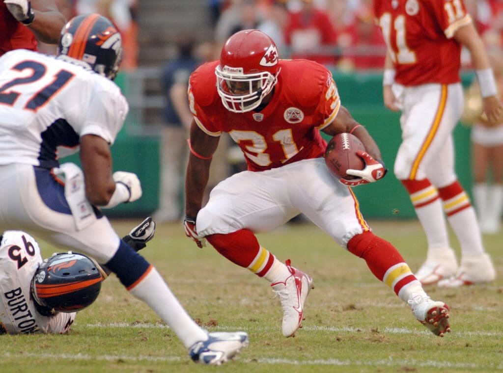 Nov 11, 2007; Kansas City, MO, USA; Kansas City Chiefs running back Priest Holmes (31) heads downfield in the second quarter in the game against the Denver Broncos at Arrowhead Stadium. Mandatory Credit: Denny Medley-USA TODAY Sports