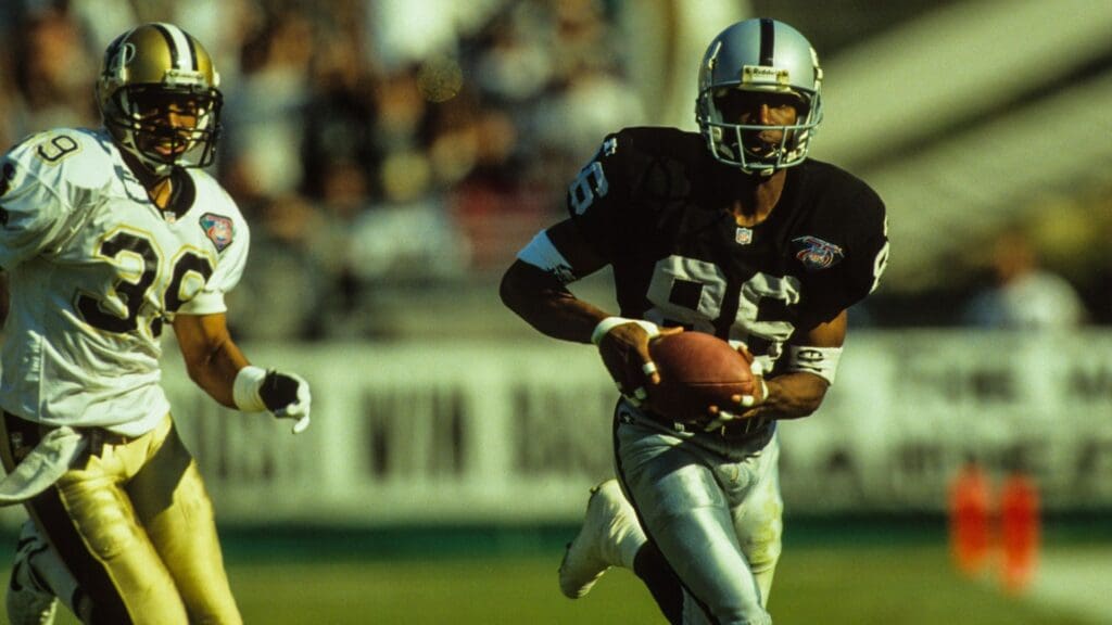 Nov 20, 1994; Los Angeles, CA, USA: FILE PHOTO; Los Angeles Raiders receiver Raghib Ismail (86) in action against New Orleans Saints defensive back Carl Lee (39) at Los Angeles Memorial Coliseum.