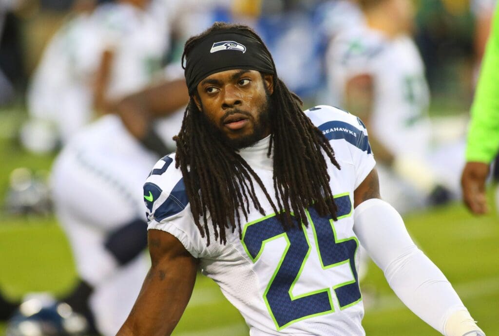 Sep 20, 2015; Green Bay, WI, USA; Seattle Seahawks cornerback Richard Sherman (25) warms up prior to a against the Green Bay Packers game at Lambeau Field. Packers won 27-17.