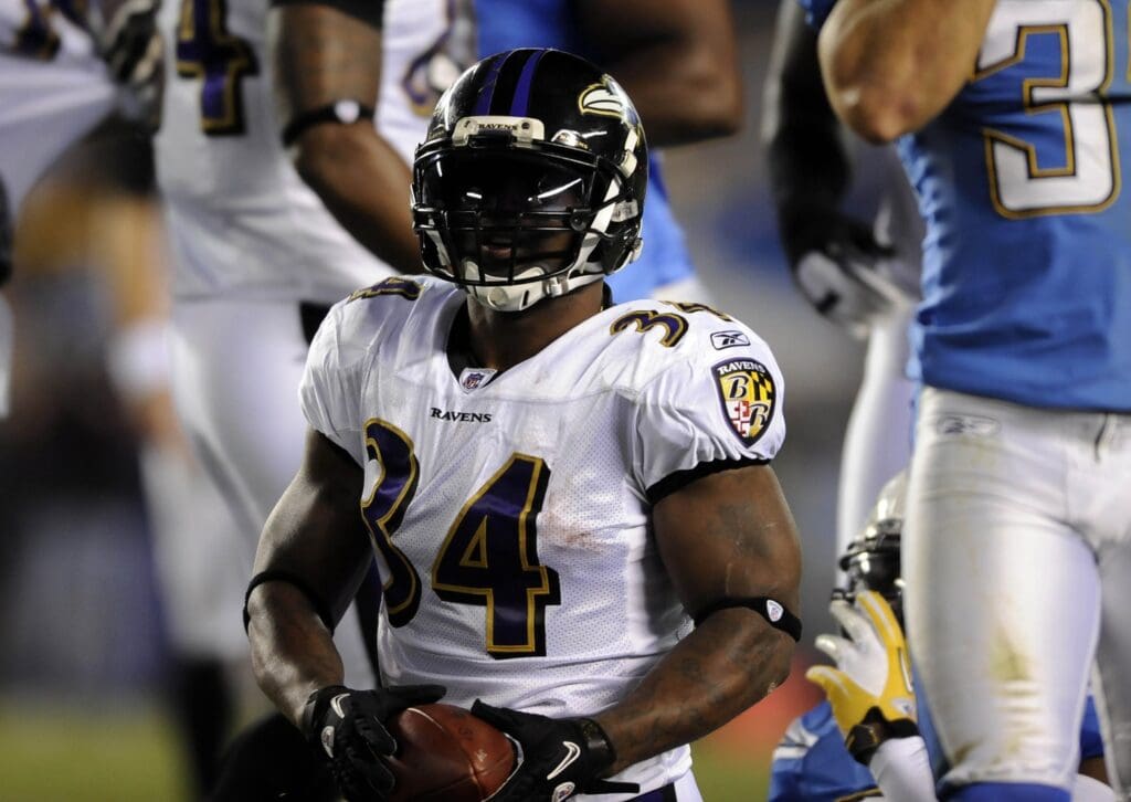 December 18, 2011; San Diego, CA, USA; Baltimore Ravens running back Ricky Williams (34) after converting a first down during the first quarter against the San Diego Chargers at Qualcomm Stadium.