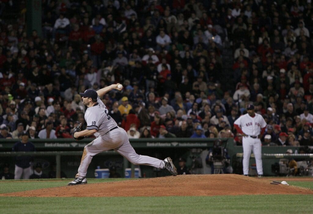 Sept 16, 2007; Boston, MA , USA; New York Yankees pitcher (22) Roger Clemens throws a pitch during the 6th inning against the Boston Red Sox at Fenway Park. The Yankees defeated the Red Sox 4-3.
