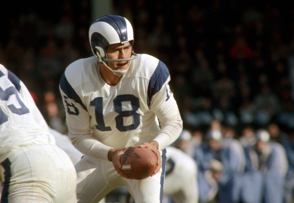 Nov 23, 1967; Detroit, MI, USA; FILE PHOTO; Los Angeles Rams quarterback (18) Roman Gabriel in action against the Detroit Lions at Tiger Stadium.