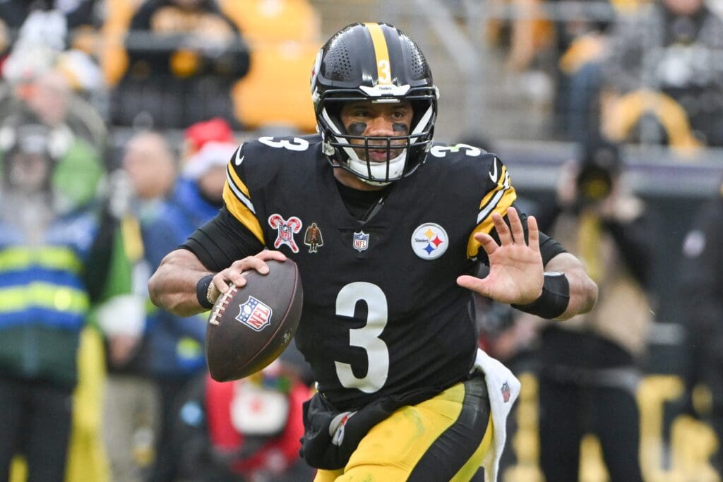 Dec 25, 2024; Pittsburgh, Pennsylvania, USA; Pittsburgh Steelers quarterback Russell Wilson (3) looks to pass against the Kansas City Chiefs during the first half at Acrisure Stadium.