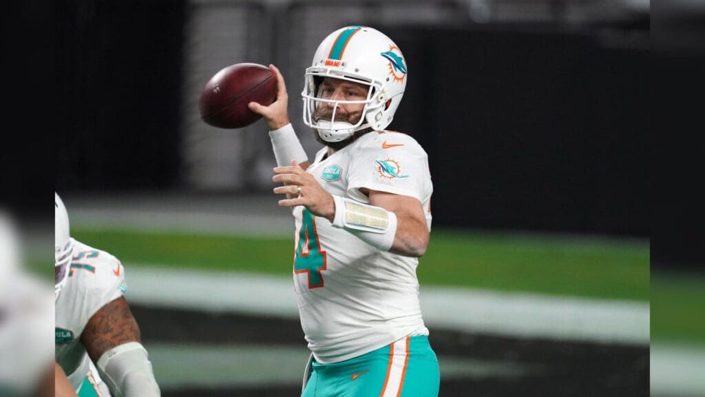 Dec 26, 2020; Paradise, Nevada, USA; Miami Dolphins quarterback Ryan Fitzpatrick (14) throws a pass in the fourth quarter against the Las Vegas Raidersat Allegiant Stadium. The Dolphins defeated the Raiders 26-25.