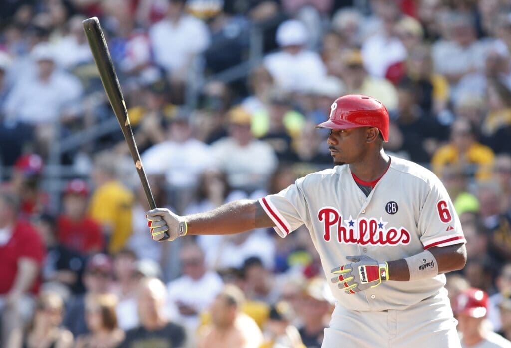 Jul 5, 2014; Pittsburgh, PA, USA; Philadelphia Phillies first baseman Ryan Howard (6) at bat against the Pittsburgh Pirates during the third inning at PNC Park. The Pirates won 3-2.