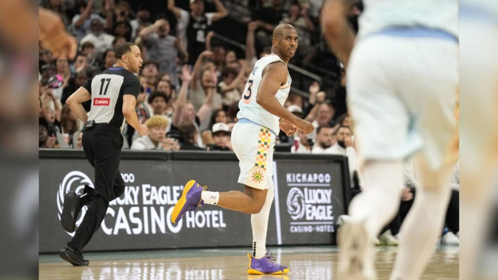 Apr 13, 2025; San Antonio, Texas, USA; San Antonio Spurs guard Chris Paul (3) after scoring during the second half against the Toronto Raptors at Frost Bank Center.