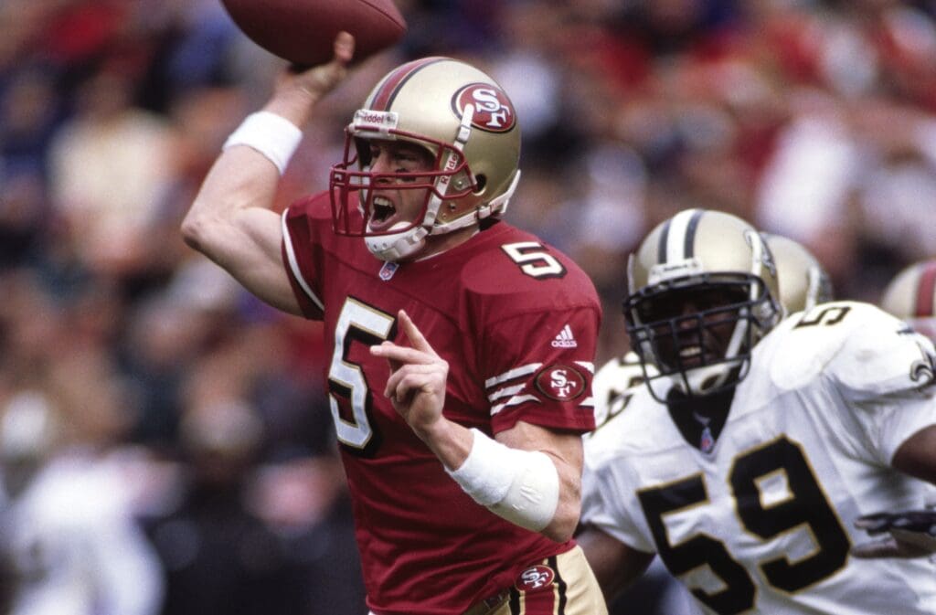 Dec 10, 2000; San Francisco, CA, USA; FILE PHOTO; San Francisco 49ers quarterback Jeff Garcia (5) in action against New Orleans Saints linebacker Keith Mitchell (59) at 3Com Park.