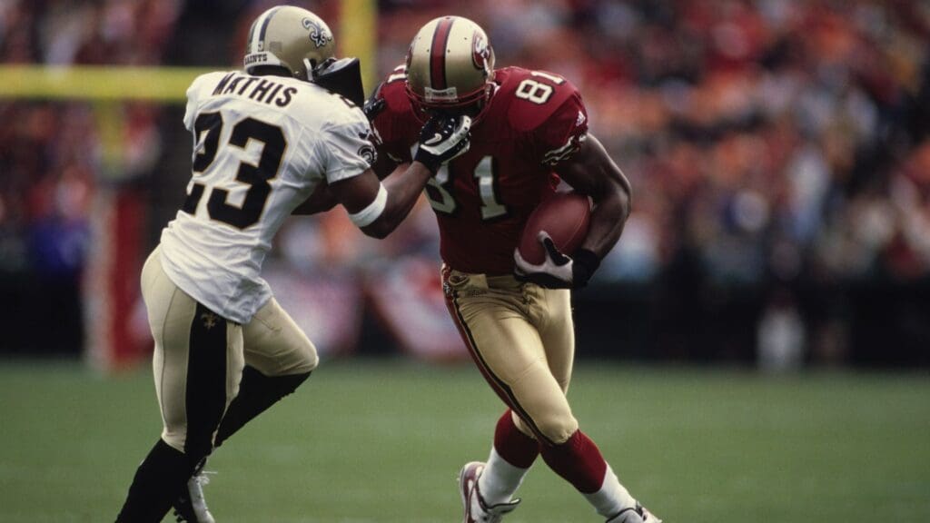 Dec 10, 2000; San Francisco, CA, USA; FILE PHOTO; San Francisco 49ers receiver Terrell Owens (81) in action against New Orleans Saints defensive back Kevin Mathis (23) at 3Com Park.
