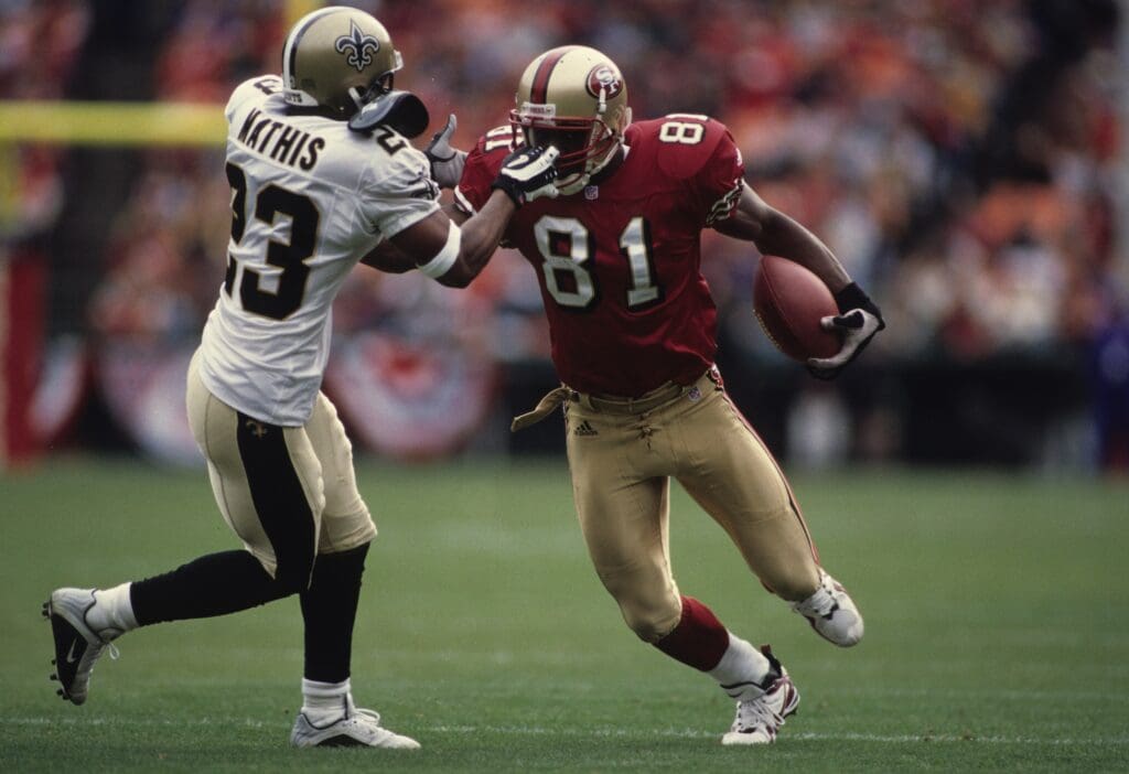 Dec 10, 2000; San Francisco, CA, USA; FILE PHOTO; San Francisco 49ers receiver Terrell Owens (81) in action against New Orleans Saints defensive back Kevin Mathis (23) at 3Com Park.