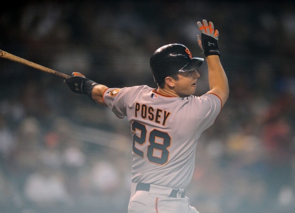 Jul. 24, 2010; Phoenix, AZ, USA; San Francisco Giants catcher Buster Posey gets a hit in the first inning against the Arizona Diamondbacks at Chase Field.