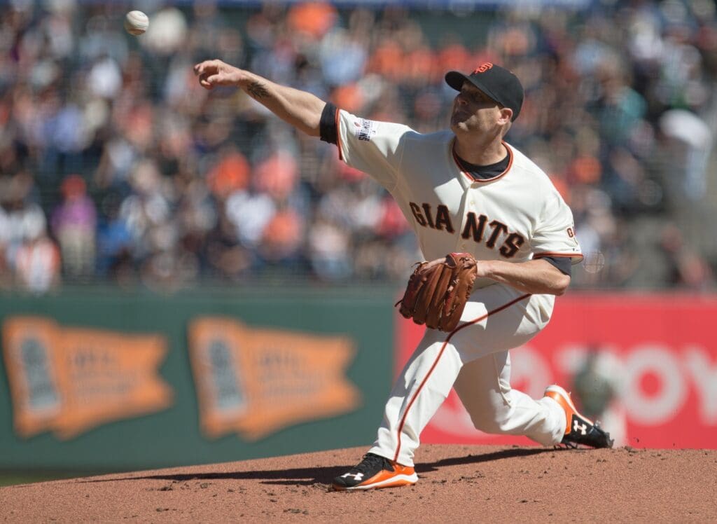 Oct 1, 2015; San Francisco, CA, USA; San Francisco Giants starting pitcher Tim Hudson (17) pitches against the Los Angeles Dodgers during the first inning at AT&T Park.