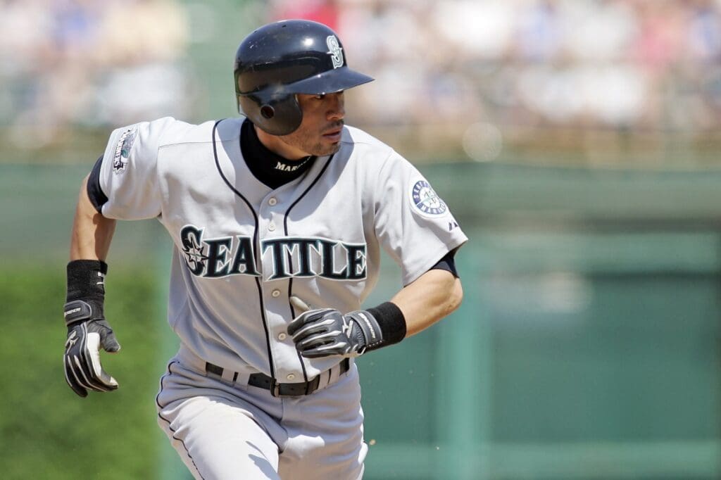 June 14, 2007; Chicago, IL, USA; Seattle Mariners center fielder (51) Ichiro Suzuki runs towards third base during the eighth inning at Wrigley Field in Chicago, IL. The Cubs beat the Mariners 5-4.