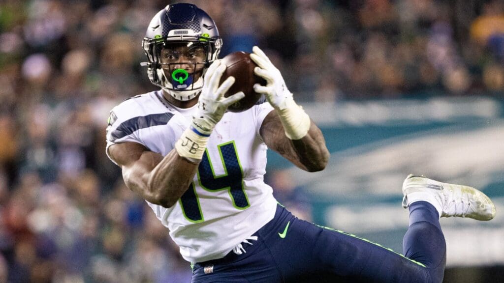 Jan 5, 2020; Philadelphia, Pennsylvania, USA; Seattle Seahawks wide receiver D.K. Metcalf (14) makes a touchdown catch against the Philadelphia Eagles during the third quarter in a NFC Wild Card playoff football game at Lincoln Financial Field.