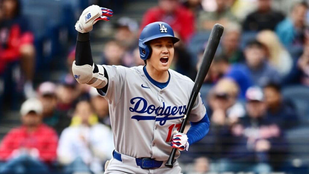 May 28, 2025; Cleveland, Ohio, USA; Los Angeles Dodgers designated hitter Shohei Ohtani (17) motions for Los Angeles Dodgers first baseman Kike Hernandez (not pictured) to come home on a wild pitch during the seventh inning against the Cleveland Guardians at Progressive Field.