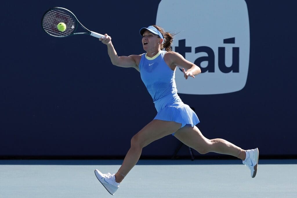 Mar 19, 2024; Miami Gardens, FL, USA; Simona Halep (ROU) reaches for a forehand against Paula Badosa (ESP) (not pictured) on day two of the Miami Open at Hard Rock Stadium.