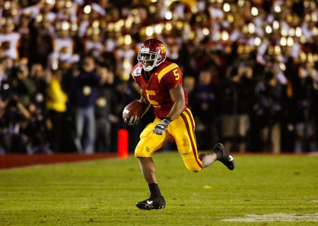 Jan 4, 2006; Pasadena, CA, USA: FILE PHOTO; Southern California Trojans running back Reggie Bush (5) in action against the Texas Longhorns during the 2006 Rose Bowl at the Rose Bowl. The Longhorns defeated the Trojans 41-38.