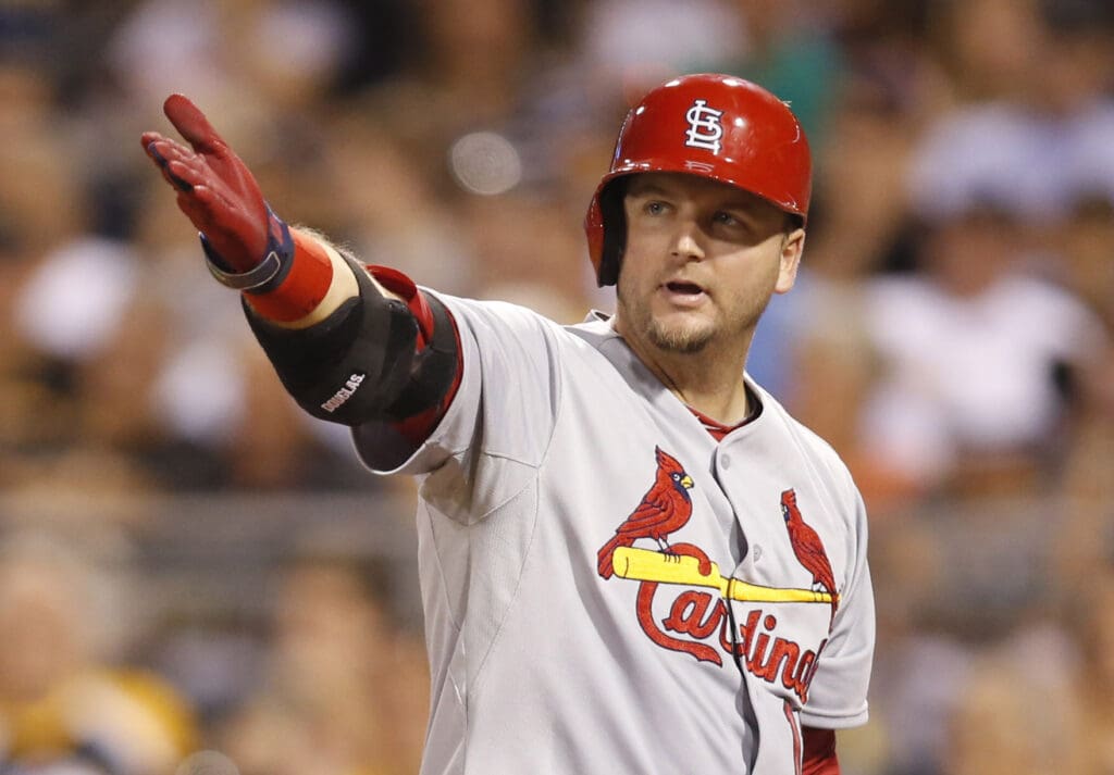 Aug 26, 2014; Pittsburgh, PA, USA;St. Louis Cardinals catcher A.J. Pierzynski (12) reacts after striking out against the Pittsburgh Pirates during the seventh inning at PNC Park.