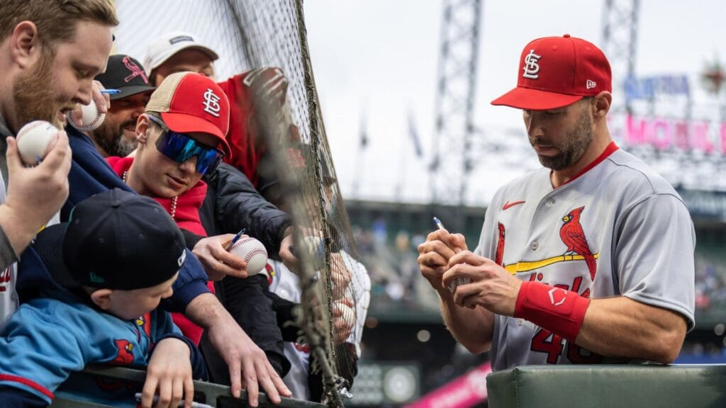 Apr 21, 2023; Seattle, Washington, USA; St. Louis Cardinals first baseman Paul Goldschmidt (46) signs autographs for fans before a game against the Seattle Mariners at T-Mobile Park.