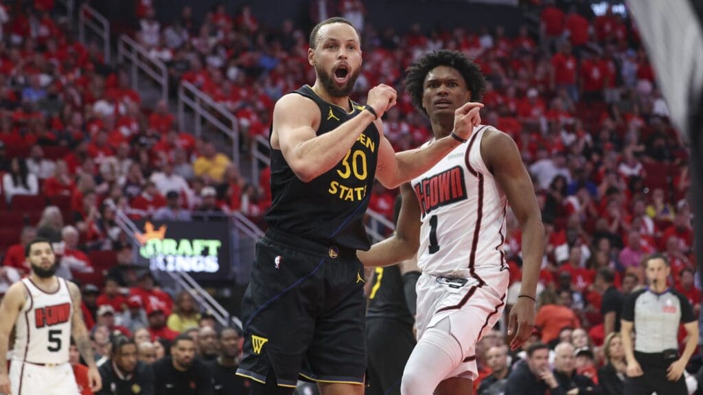 May 4, 2025; Houston, Texas, USA; Golden State Warriors guard Stephen Curry (30) and Houston Rockets forward Amen Thompson (1) react after a play during the fourth quarter of game seven of the first round for the 2025 NBA Playoffs at Toyota Center.
