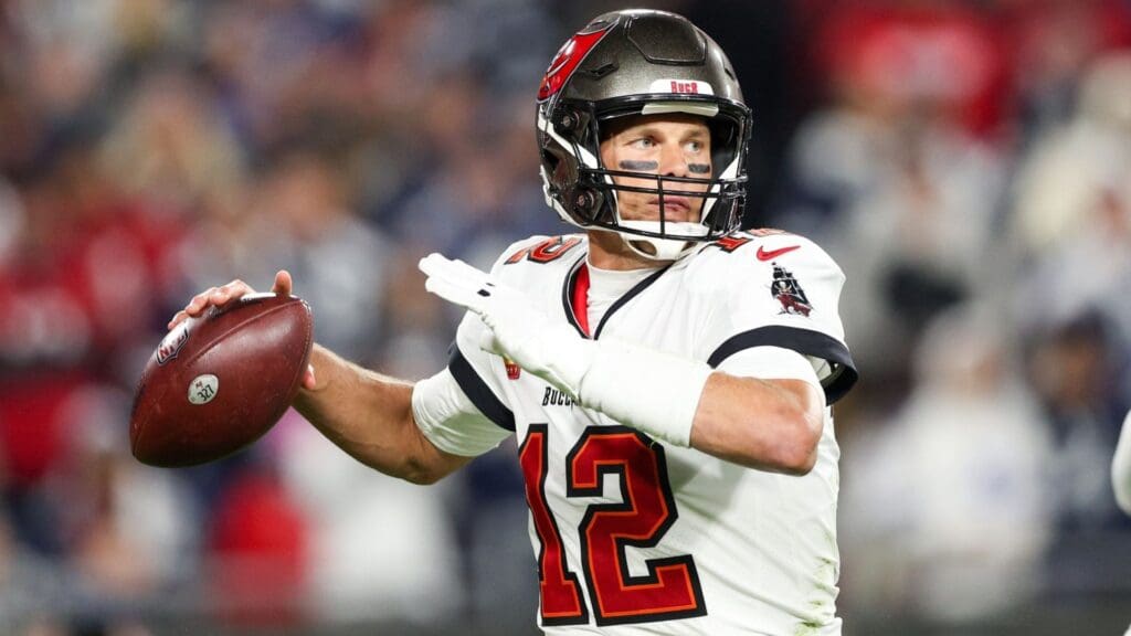 Jan 16, 2023; Tampa, Florida, USA; Tampa Bay Buccaneers quarterback Tom Brady (12) drops back to pass against the Dallas Cowboys in the third quarter during a wild card game at Raymond James Stadium