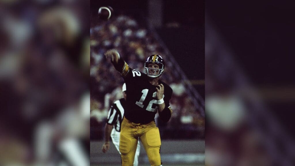 Aug 25, 1970; Pittsburgh, PA, USA; FILE PHOTO; Pittsburgh Steelers quarterback Terry Bradshaw (12) throws the ball against the New York Giants during a preseason game at Three Rivers Stadium.