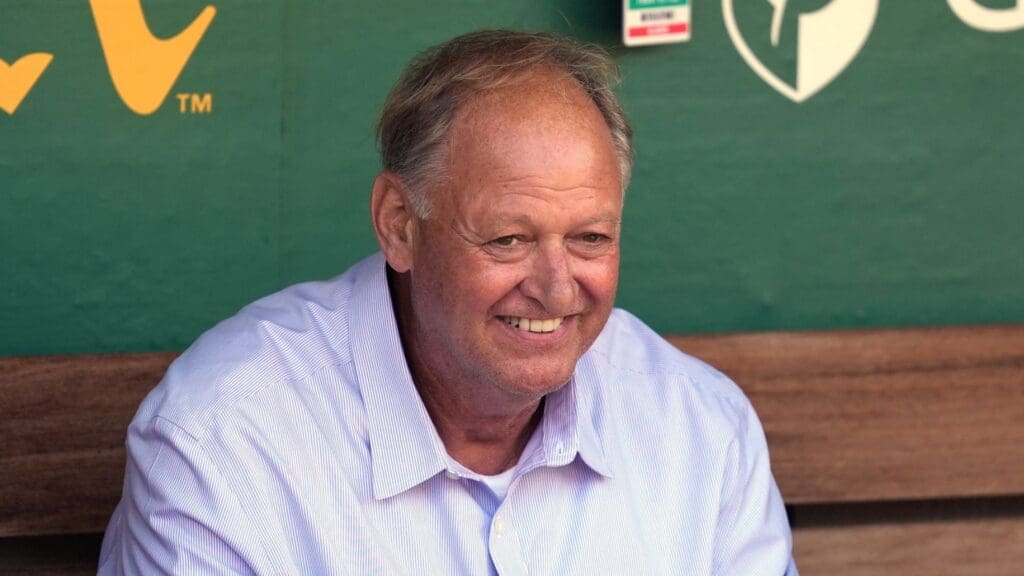 Aug 17, 2024; Oakland, California, USA; Oakland Athletics former catcher Terry Steinbach sits in the dugout before the game against the San Francisco Giants at Oakland-Alameda County Coliseum.